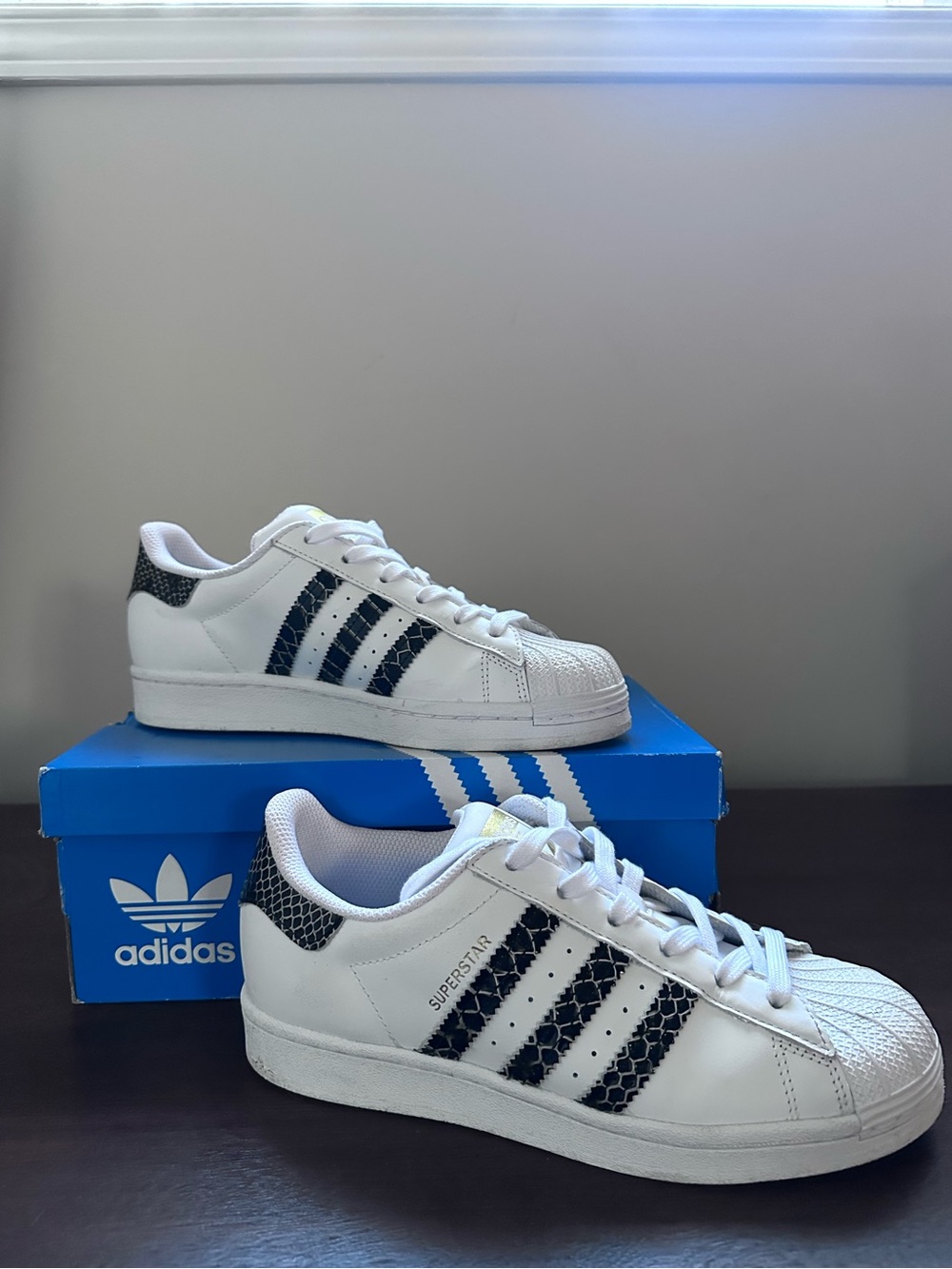 adidas Women’s Superstar Sneakers in White with Snakeskin Accents